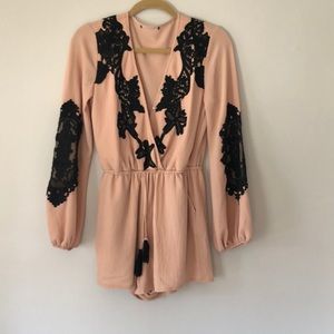 Blush Romper with black lace detail
